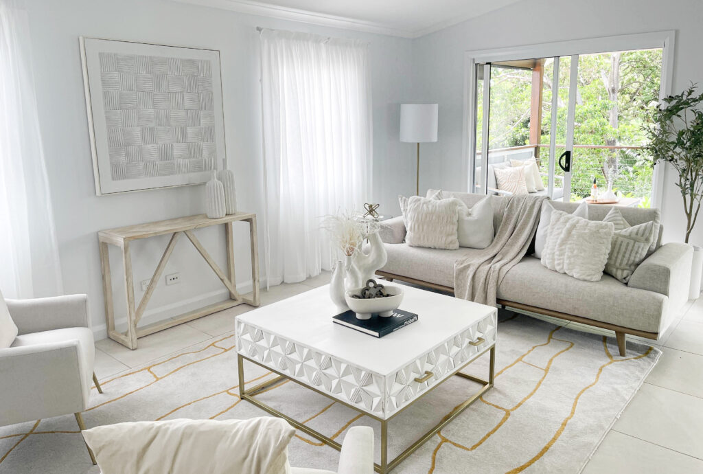 A Warm, Cozy Living Room with a Verandah Opening | Styled and Staged with Plants by Sell in Style, Brisbane
